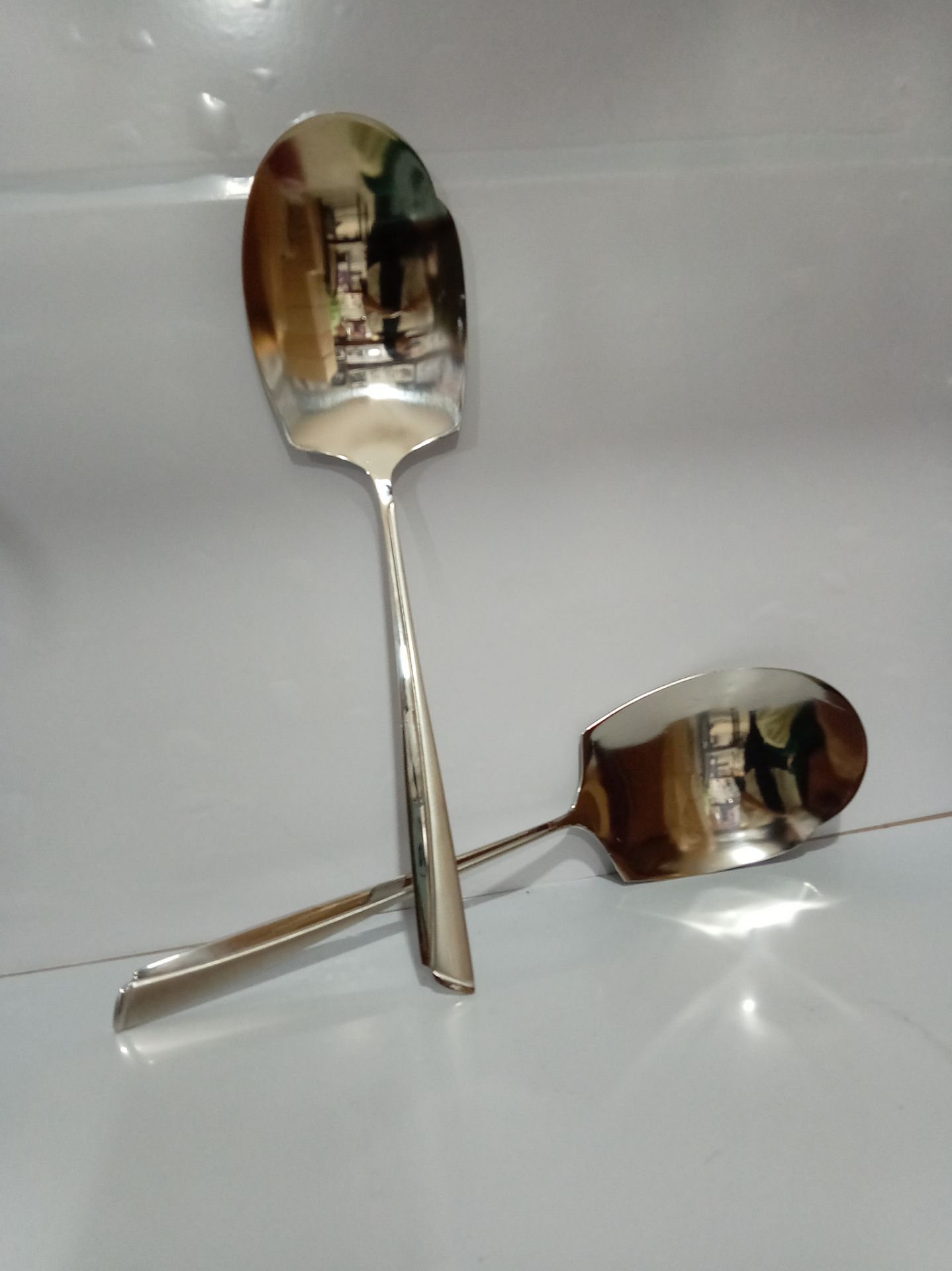 کفگیر استیل یونیک  طرح ناخنی